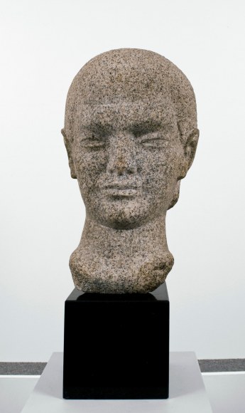 William Zorach, Head of a Boy (Tessim), 1925, granite 16 1/2 inches high