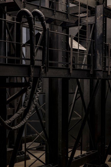 Ship/Dock/Three Houses and the Night Sky, 2023, Wood, plastic, glass, acrylic paint, electrical fixtures, metal, video projections, sound, darkness, 12’ x 29’9” x 14’9”