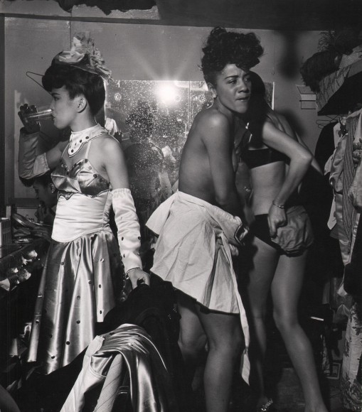 Wayne Miller, Female Impersonator, Chicago, ​1946&ndash;1947. Three figures in various states of undress in a dressing room.