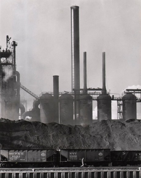 37. Charles E. Rotkin (American, 1916-2004), Republic Steel Corp. Blast furnace stoves on the Cuyahoga Canal. In the foreground are ore piles, Cleveland, Ohio, 1957