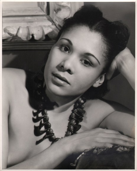 Alfredo Valente, Katherine Dunham, ​c. 1940. Subject is photographed leaning on one arm, looking into the camera.