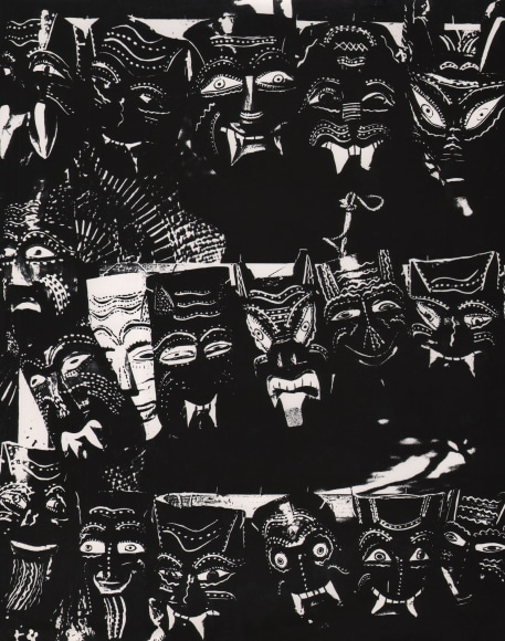 Marguerite Johnson, Las Mascaras, ​c. 1955&ndash;1960. High-contrast image of three rows of large masks.