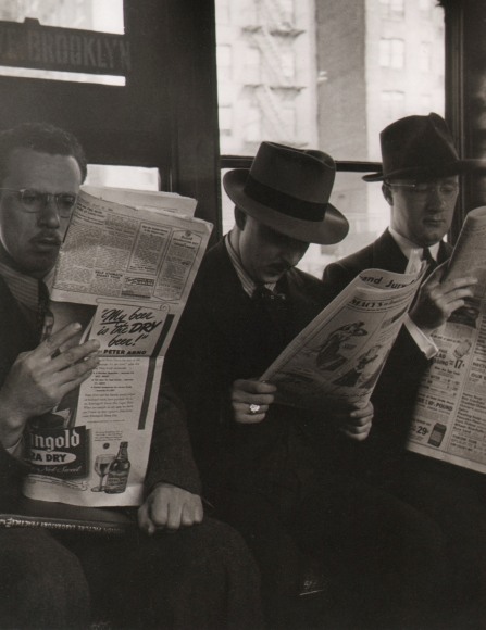 25. Jeanne Ebstel, Untitled, c. 1945. Three seated men reading newspapers.