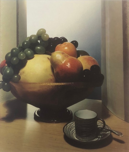 Hi Williams, Untitled, ​c. 1935. Color still life composition with a large bowl of fruit and a ceramic mug and metal spoon on a saucer.