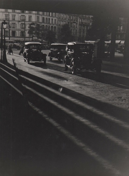 23. Marcel Bovis (French, 1904-1997), Les Taxis Sous le Pont de La Gare Montparnasse, c. 1925