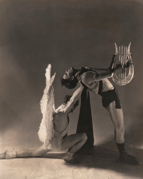 George Platt Lynes, Apollo &amp; the Muses, Lew Christensen &amp; William Dollar, Balanchine's Orpheus &amp; Eurydice, ​1936. Male figure holding a harp leans against a kneeling angel figure supporting him by the shoulders.