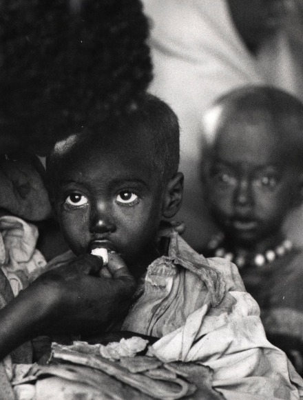 20. Faces In Emergency Camp: Children as they were being fed by the surviving parent, or parents, in a dislocation camp in&nbsp;Ethiopia.