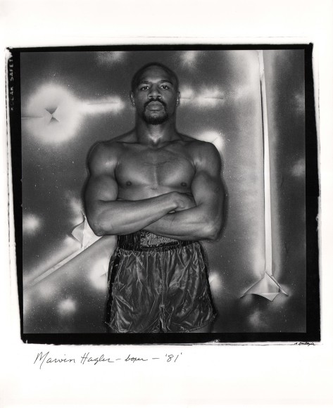Anthony Barboza, Marvin Hagler - Boxer, ​1981. Subject stands in center of square frame, shirtless with arms crossed and looking to camera.