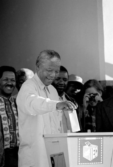 11. Nelson Mandela Votes: Nelson Mandela made a symbolic gesture by voting in a Zulu township in Durban, South Africa. Mr. Mandela&rsquo;s ethnic origin is Khosa, which has been an ethnic rival of the Zulu nation for decades, 1994.