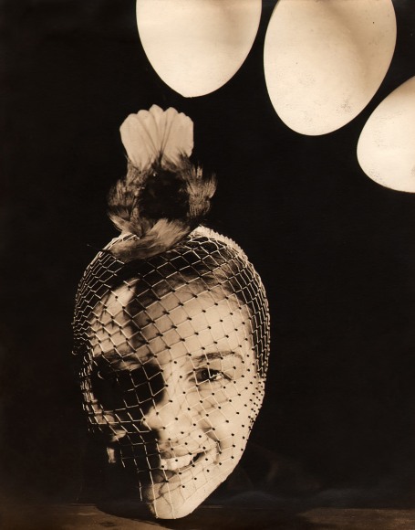 George Platt Lynes, Ruth Ford with Hummingbird, c. 1939. Composite photo with subject's head and face covered in netting with a hummingbird on top.