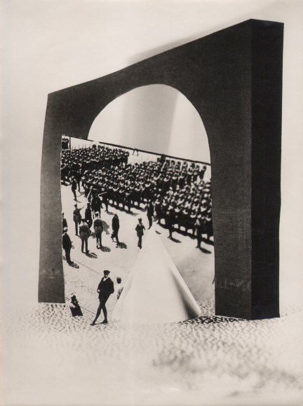 Claude Tolmer, Composition photo et papier, ​1934. Cut out print of soldiers composed beneath a black bridge-like shape.