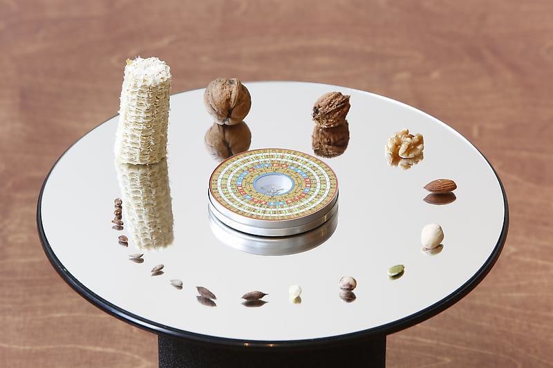 Donghee Koo. 528, 2013. Seeds and nuts, rotated display with mirror, 32 x 32 x 24 cm. Courtesy of the artist & PKM Gallery.