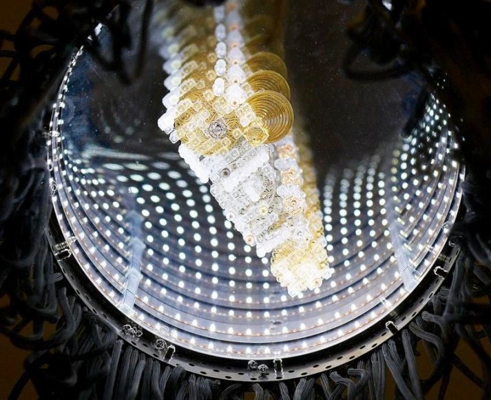 Lee Bul. Untitled (“Infinity” suspended B03-1) (detail), 2015. Stainless steel, aluminium, metal mesh tube, acrylic mirror, two-way acrylic mirror, LED lights, crystal, acrylic beads, plated brass and nylon strap, 130 x 45(diameter) cm. Courtesy of the artist & PKM Gallery.