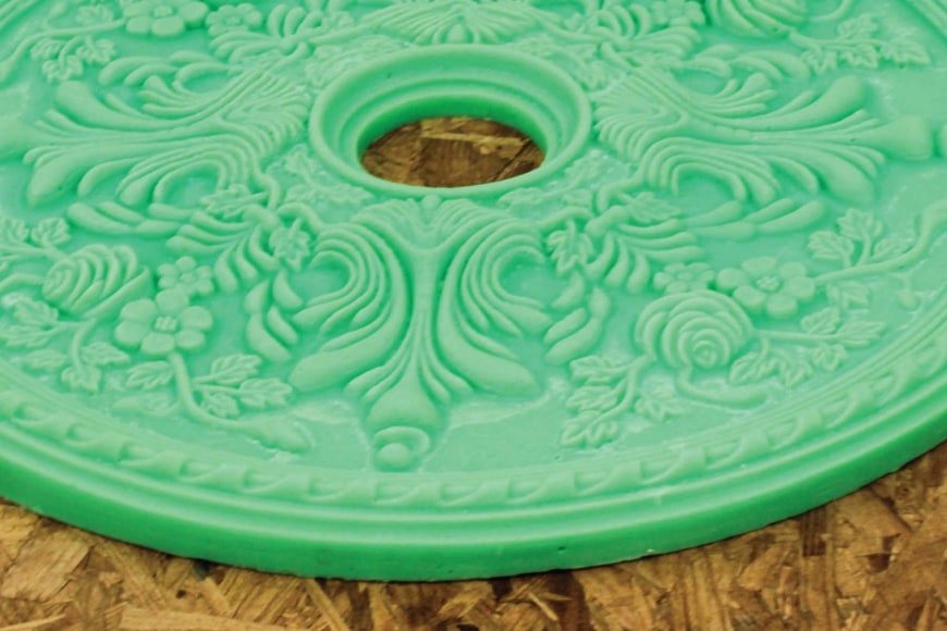 MAGALI H&Eacute;BERT-HUOT  Untitled (Medallion) 2013, OSB, wax, 40 x 40 x 10 inches.