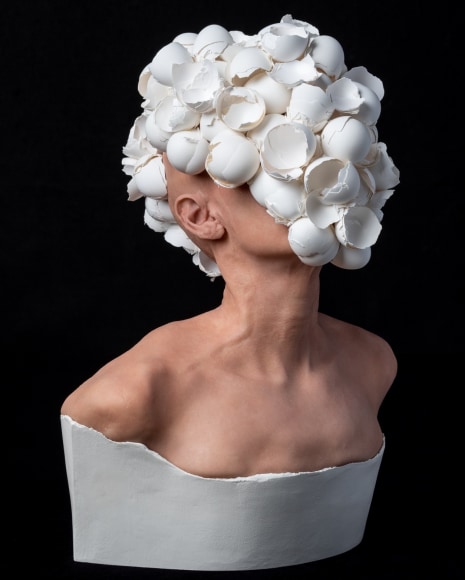 J.J. McCracken  The Feeding  2020, painted platinum silicone lifecast, eggshells, ceramic, 22 x 16 x 12 inches.