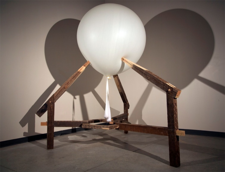 SUTTON DEMLONG Big Britches  2014, weathered pine, weather balloon, spandex, sand, 94 x 87 x 90 inches.