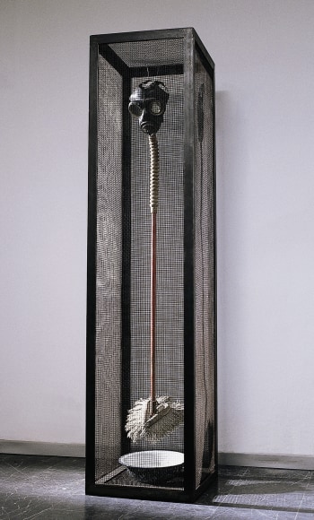 Hale Tenger, I Know People Like This, 1992, Gas mask, mop, water, iron mesh, iron, 50 x 45 x 190 cm