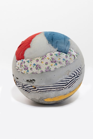 Rossella Biscotti, A shirt, blue pants, blue jean, a towel, 2020, Concrete, various used textile, 40 cm (diameter)