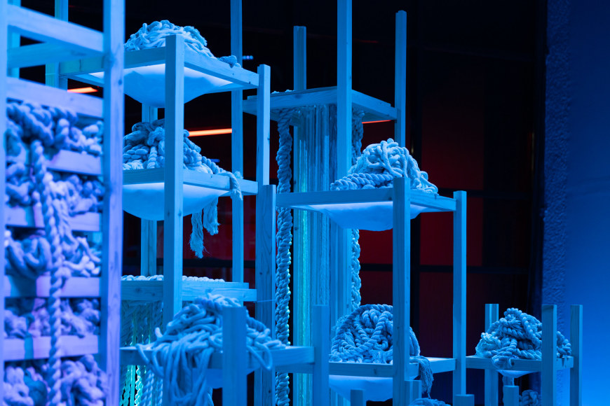 Afra Al Dhaheri, D-constructing Collective Exhaustion, 2024, Light, rope, sound, wood, Dimensions variable