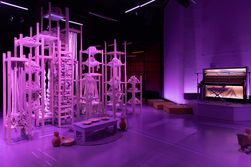 Afra Al Dhaheri, D-constructing Collective Exhaustion, 2024, Light, rope, sound, wood, Dimensions variable