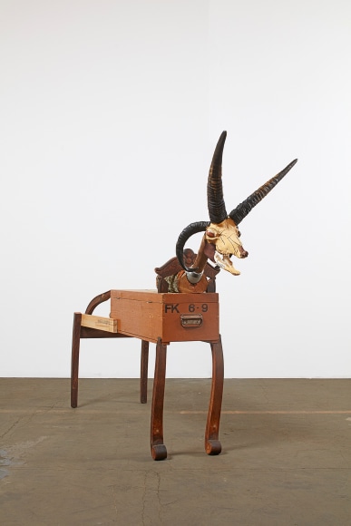 jimmie durham. manx loaghtan, 2017. four-horned sheep skull, leather, glass, wood, steel