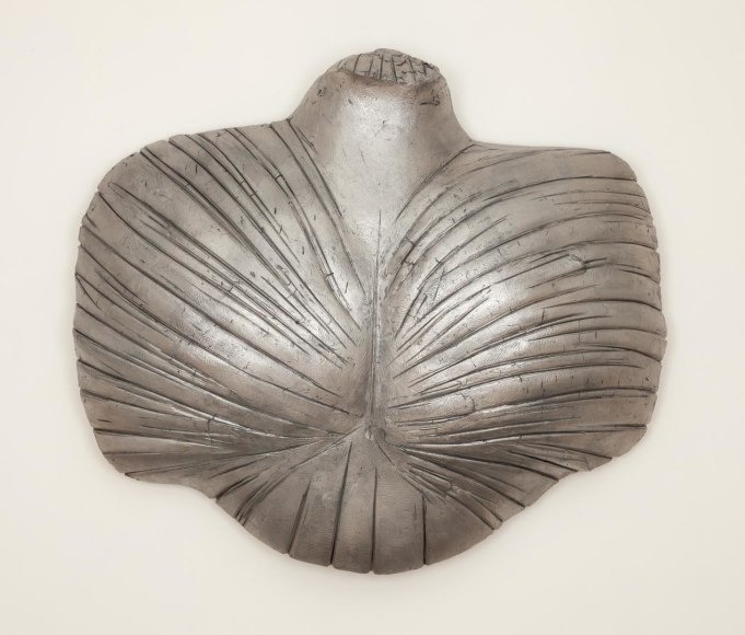 Deity XXXII deity in palladium leaf and gray clay