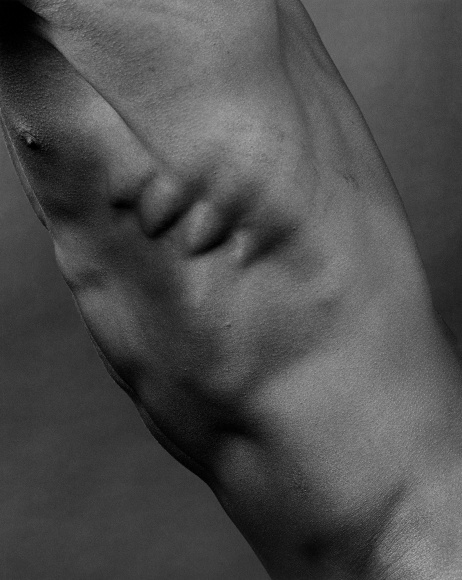 Male's torso, ribs protruding.