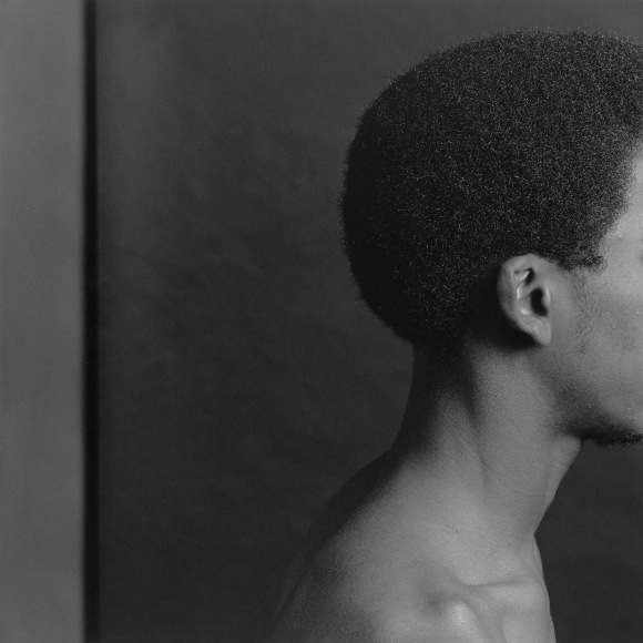 Eric's neck, head, ear and cheek.