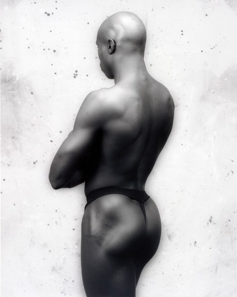 Nude Ken Moody from behind.