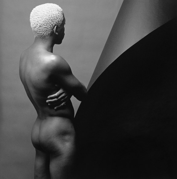 Leigh Lee facing away from camera.