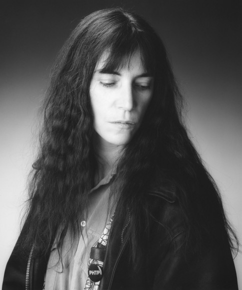 Portrait of Patti Smith in 3/4 view.