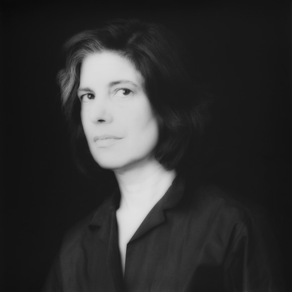 Portrait of Susan Sontag in 3/4 view.