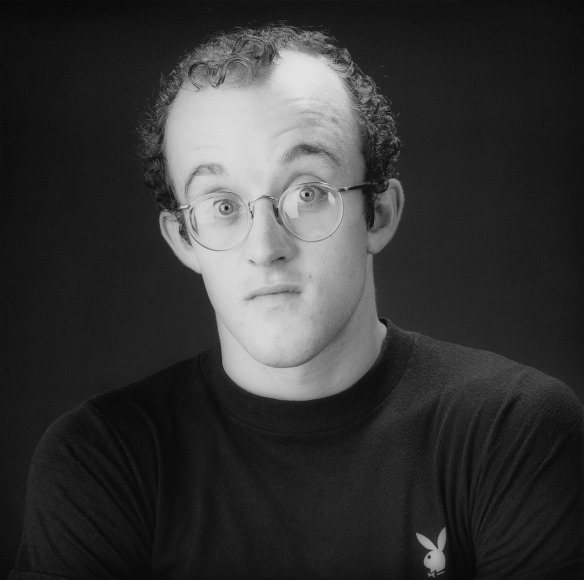 Portrait of Keith Haring, eyes wide open.