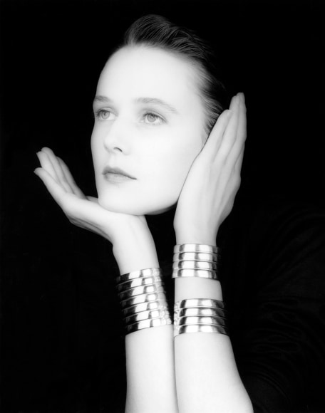 Portrait of white woman in 3/4 view.