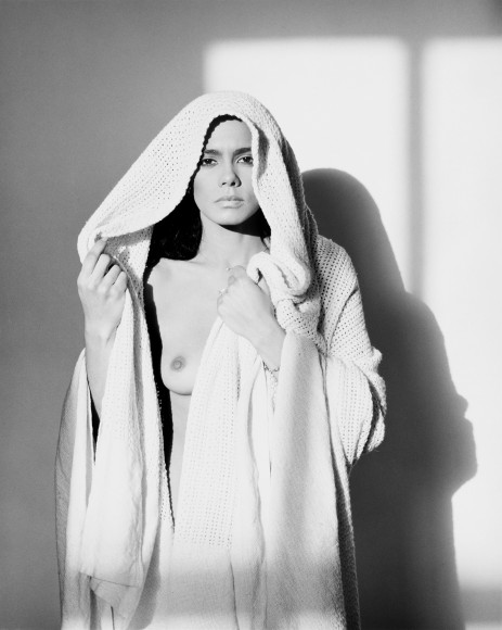 Maybelle facing camera, wrapped in a cloth.