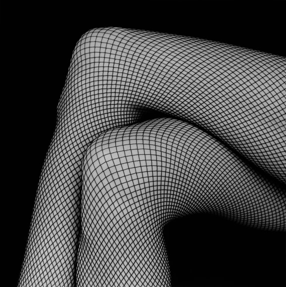 Portrait of legs in fishnets.