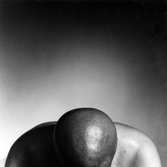 Cedric's head and shoulders, face not visible.