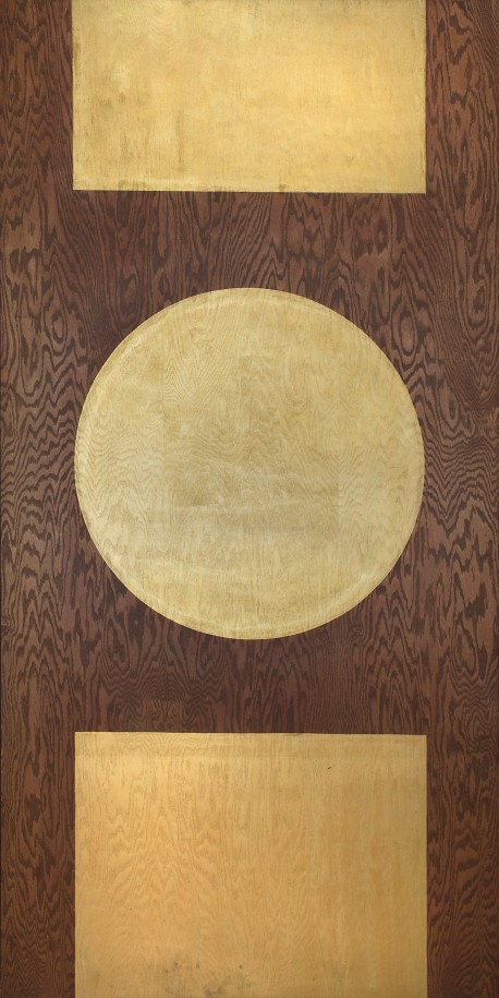 One Golden Orb, a painting of a large golden orb in the center of a plywood panel. Above and below the orb are two golden rectangles. The bottom rectangle is taller than the top one.
