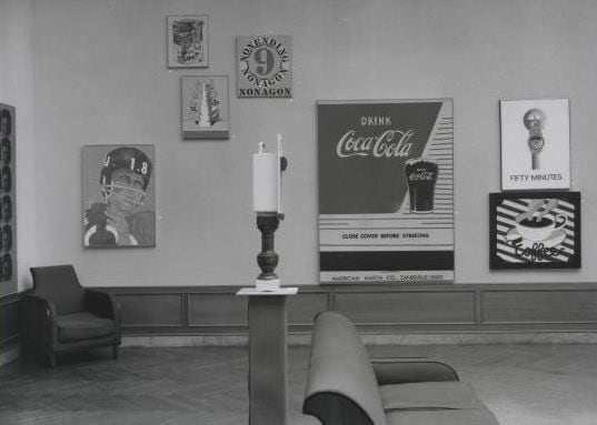 Installation view of Signs of the Times Three: Paintings by Twelve Contemporary Pop Artists, Des Moines Art Center, Des Moines, Iowa,December 6, 1963&ndash;January 19, 1964, with Polygon: Nonagon (1962)