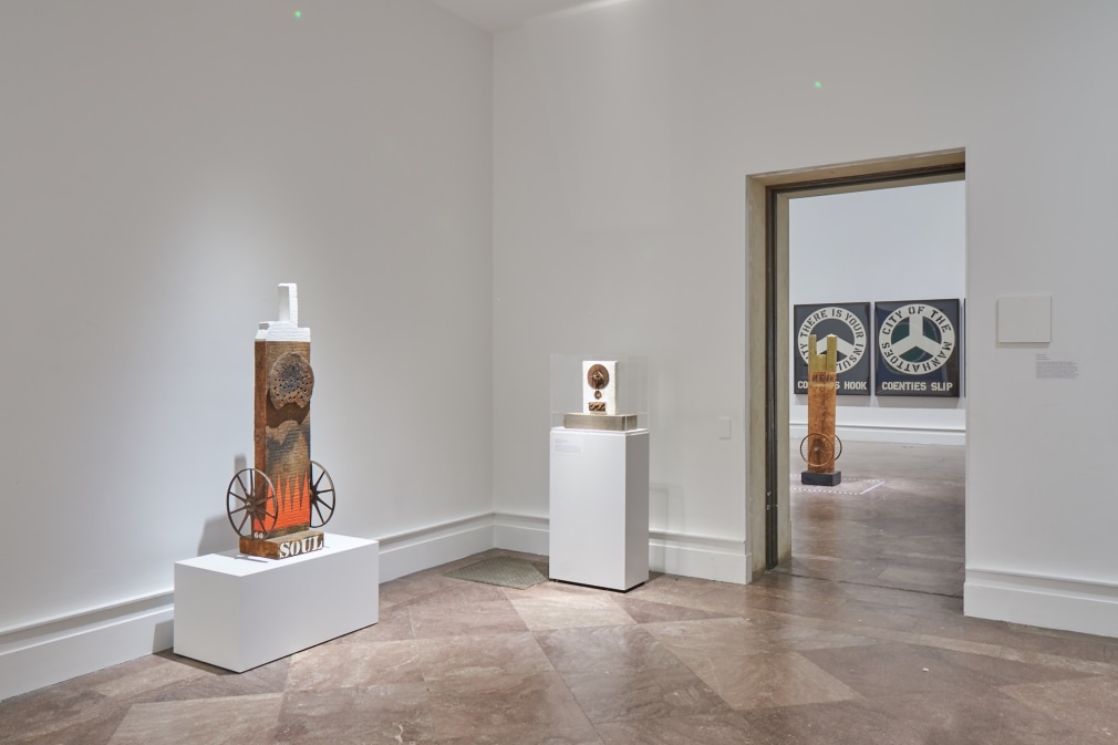 Installation view of Robert Indiana: A Sculpture Retrospective, Albright-Knox Art Gallery, Buffalo, New York, June 16&ndash;September 23, 2018. Left to right, Soul (1960), Zenith (1960), Call Me Indiana (1964/1998), and The Melville Triptych (1962), &nbsp;