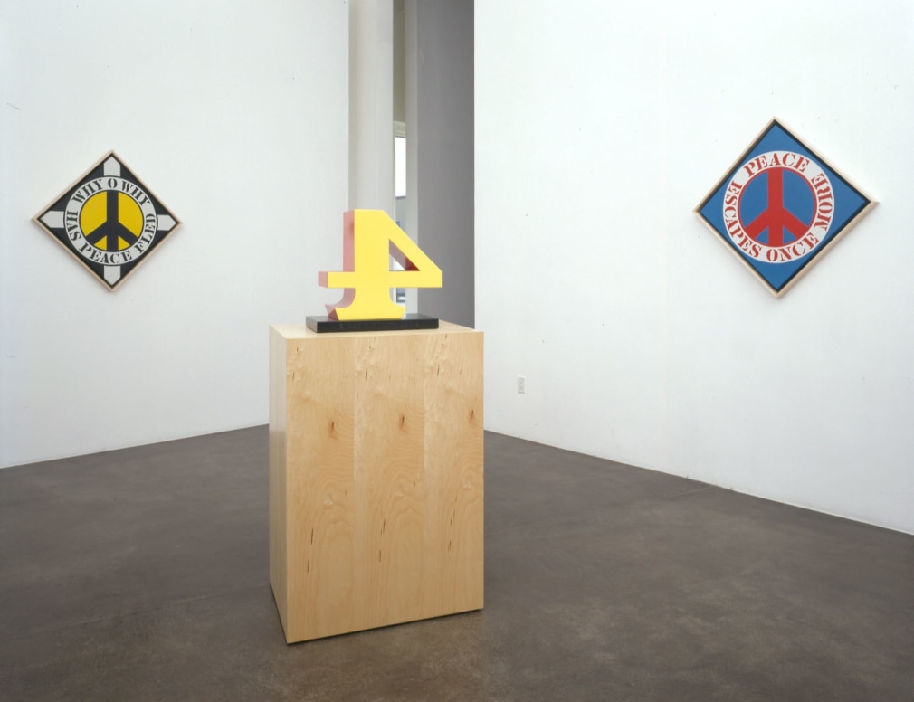 Installation view, Robert Indiana: New Paintings and Sculptures, Michael Kohn Gallery, Los Angeles, September 19&ndash;October 25, 2003. Left to right, Why O Why Has Peace Fled (2003), FOUR (1978&ndash;2003), and Peace Escapes Once More (2003)
