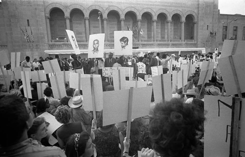 Mississippi Freedom Democratic Party supporters demonstrating outside the 1964 Democratic National Convention, Atlantic City, New Jersey; some hold signs with portraits of civil rights workers James Earl Chaney, Andrew Goodman, and Michael Schwerner, who were abducted and murdered in the city of Philadelphia, Mississippi, &nbsp;
