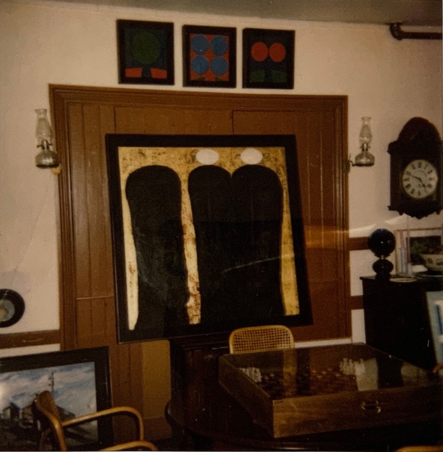 Polaroid photograph of&nbsp;Tekel (&ldquo;Brothers&rdquo; Odd Fellows), at the Star of Hope, Vinalhaven, Maine, before the word &quot;Tekel&quot; was added to the work. Above the painting is Ra (ca. 1961), &nbsp;