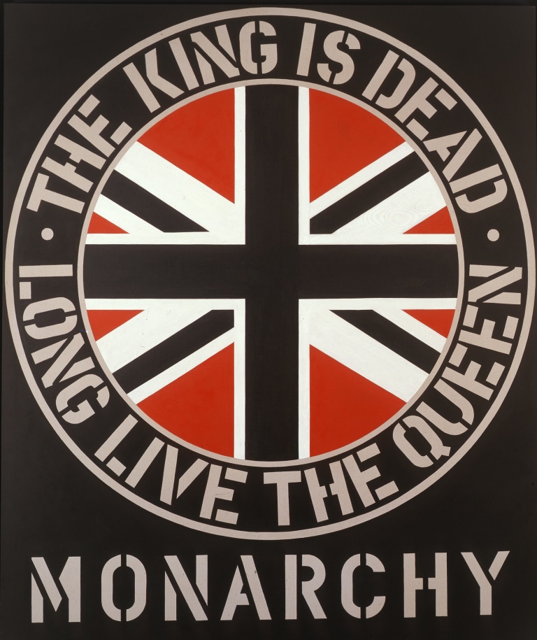 A 60 by 50 inch black canvas with the title, Monarchy, painted in beige stenciled letters across the bottom. Above is a circle, with the Union Jack in the center, surrounded by a black ring with beige outlines. inside the ring is the beige stenciled text &quot;The King is dead. Long live the Queen.&quot;