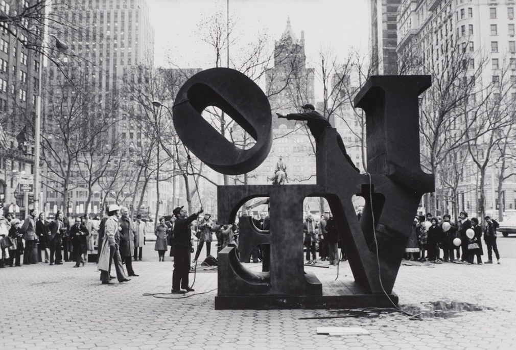 Installation of Indiana's 144-inch Cor-Ten steel&nbsp;LOVE&nbsp;at Fifth Avenue and Sixtieth Street, New York, November 1971. The tilted letter &quot;O&quot; is being lowered on top of the letter &quot;E&quot;