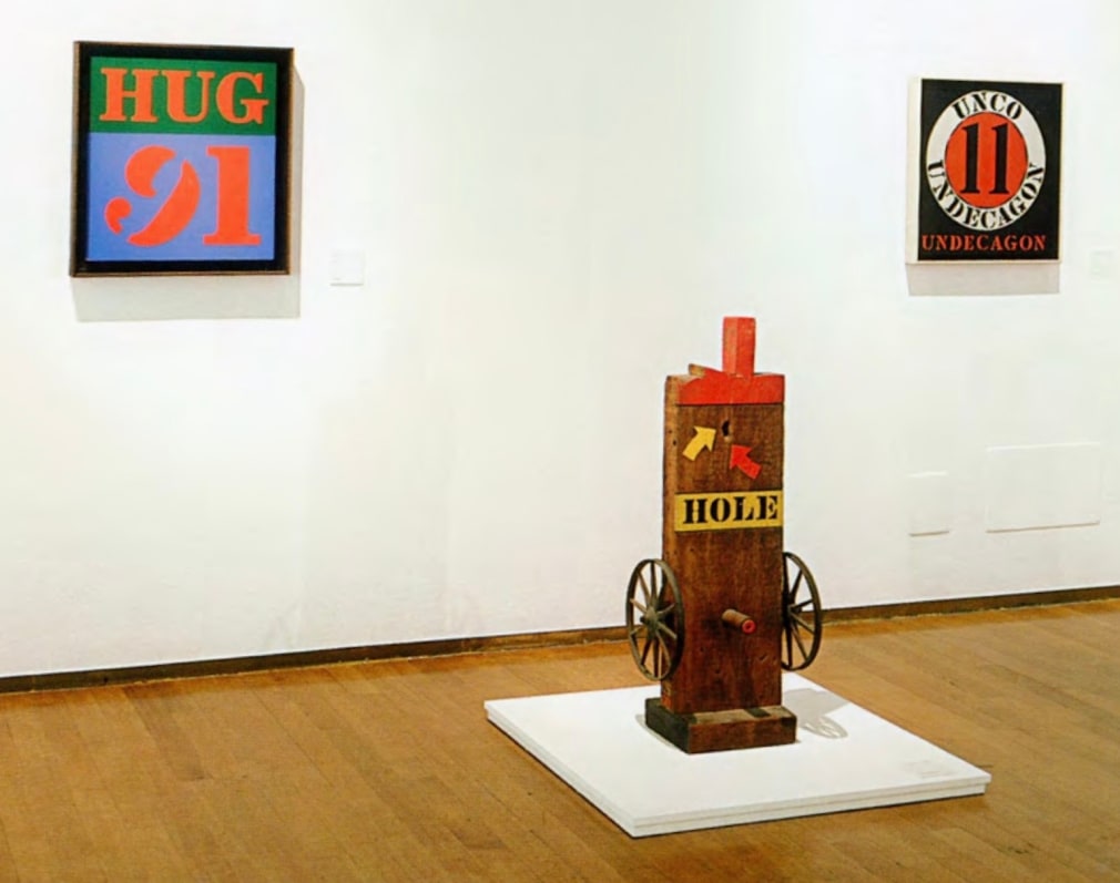Installation view of&nbsp;Robert Indiana a Milano,&nbsp;Padiglione d&rsquo;Arte Contemporanea, Milan, July 4&ndash;September 14, 2008. Left to right,&nbsp;Hug (1991), Hole (1960&ndash;62), and Polygon: Undecagon (1962)