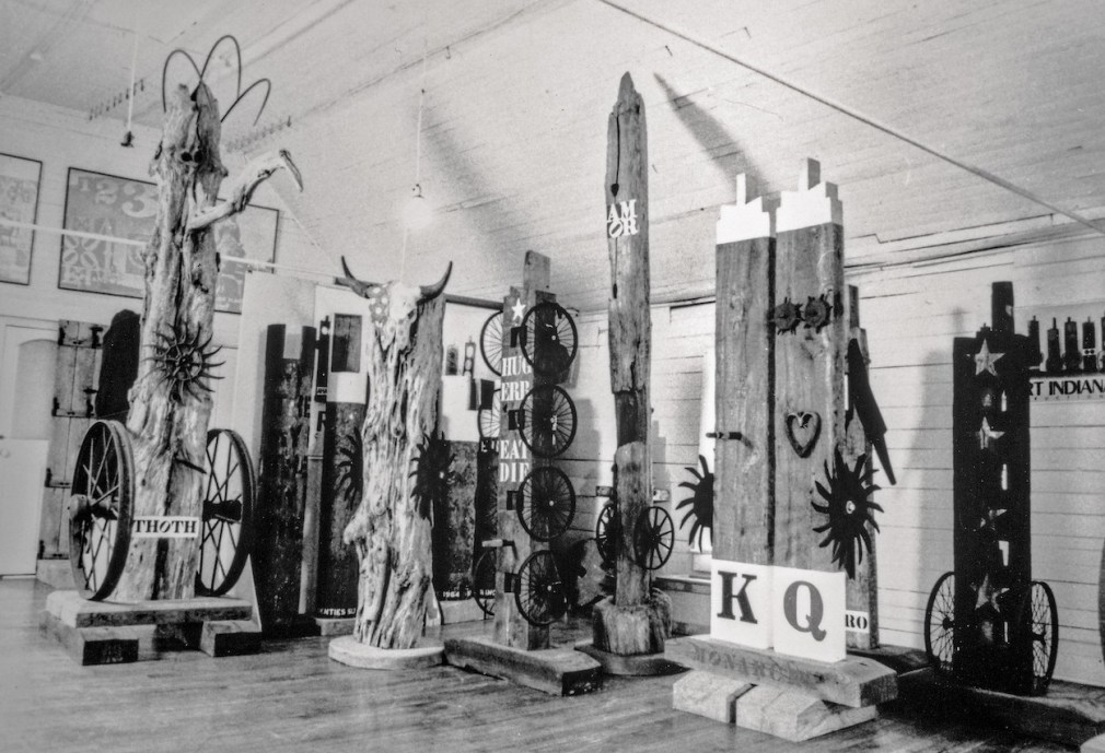Wood sculptures in Indiana&rsquo;s studio on Vinalhaven in 1998. Left to right, Thoth (1985), USA (1996), The American Dream (1992), Amor (1996), Monarchy (1981), and Four Star (1993)