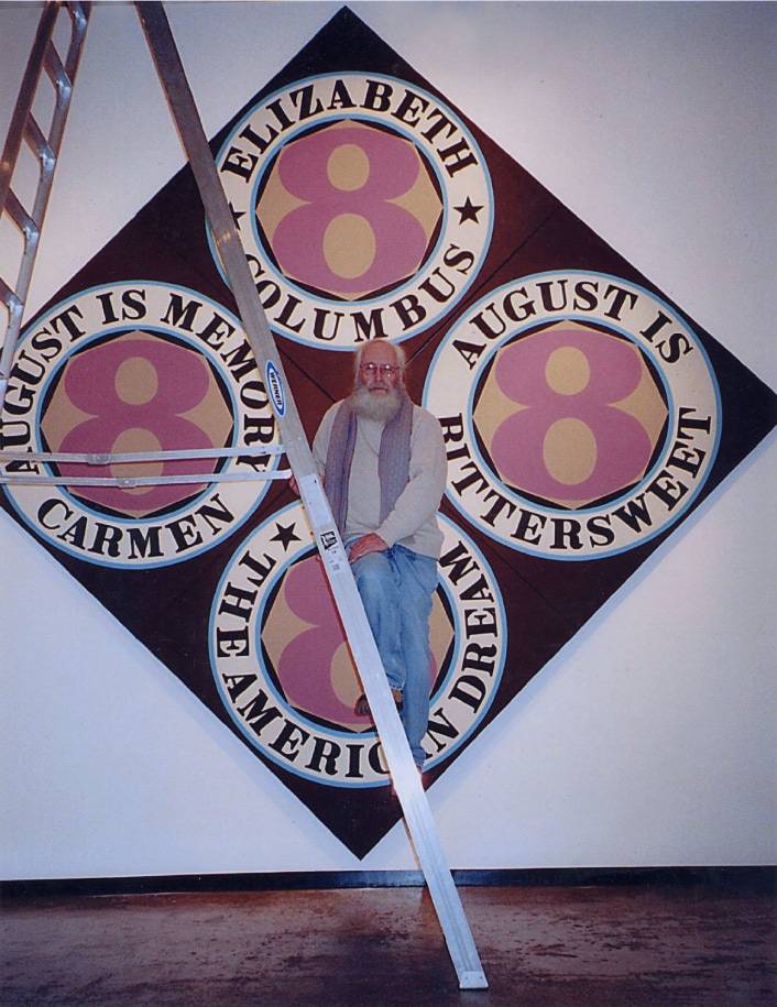 Indiana installing The Eighth American Dream (2000) at the Kasmin Gallery, New York, for the exhibtion&nbsp;Robert Indiana: Recent Paintings, February 14&ndash;March 22, 2003
