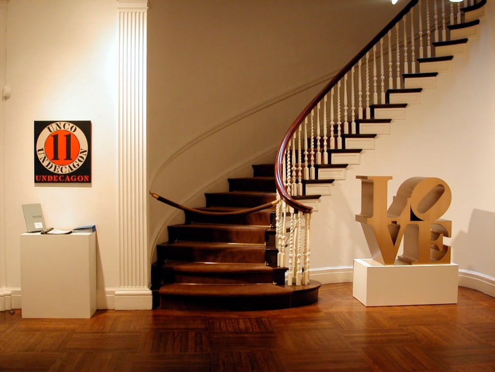 Installation view of&nbsp;Robert Indiana: Letters, Words and Numbers, C&amp;amp;M Arts, New York, February 13&ndash;March 22, 2003. Left to right, Polygon: Undacagon (1962) and LOVE (1966&ndash;1999)