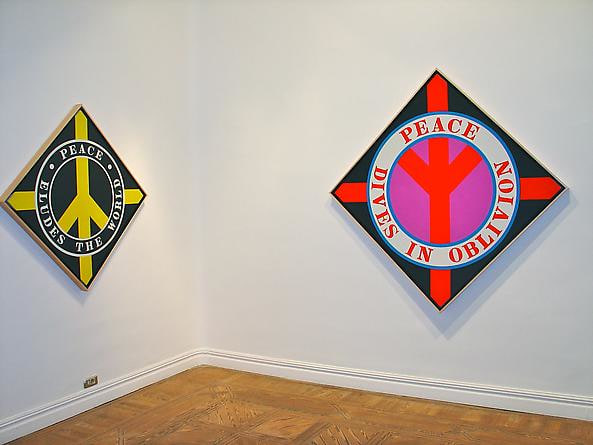 Installation view of&nbsp;Robert Indiana: Obra reciente,&nbsp;Galer&iacute;a Javier L&oacute;pez, Madrid, November 5&ndash;December 31, 2004. Left to right, Peace Eludes the World (2003) and Peace Dives in Oblivion (2003)